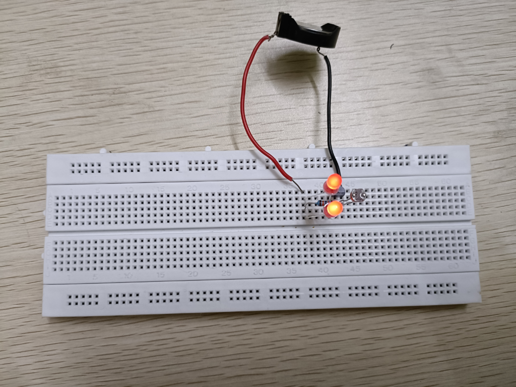LED and 3v Battery holder on breadboard image