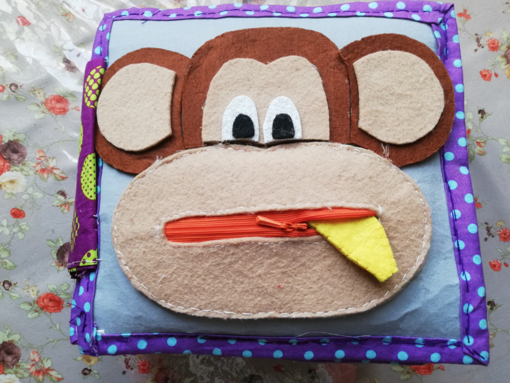 Zipping monkey quiet book page image